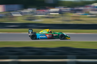 Blue and yellow on the road of F1 cars
